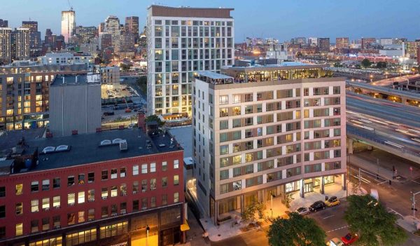 Troy Boston is 400,000 square feet and includes a rooftop garden and enclosed courtyard.