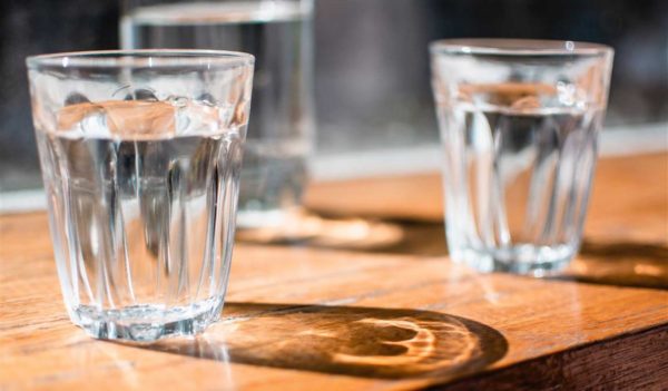 water glasses on bar