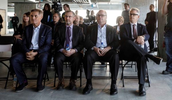 Glen Scott, president of Katz Group Real Estate; Keith Shillington, Stantec senior vice president; Dan Lefaivre, Stantec executive vice president and chief financial officer; and Gord Johnston, Stantec president and CEO, sitting next to one another.