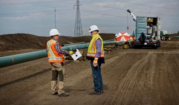 Workers on the site of a pipeline