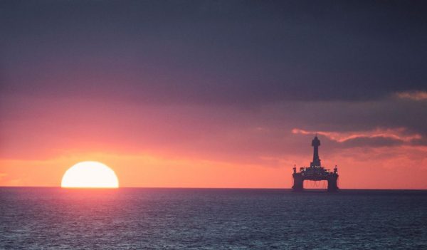 Sunset near oil rig