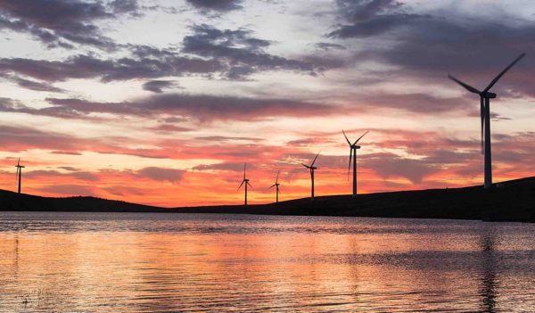 windmills and lake and sunset in ireland