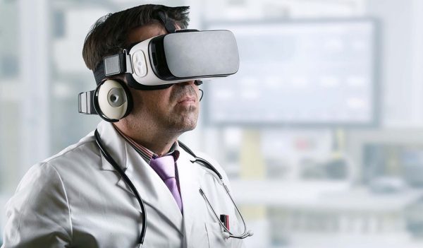 Male doctor with virtual reality glasses