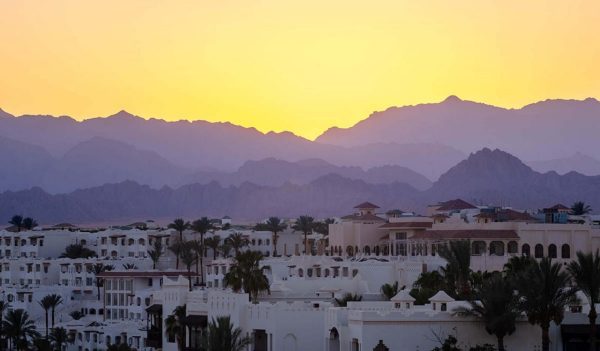 Resort hotels against the backdrop of the mountains during sunset, Sharm El Sheikh, Egypt.