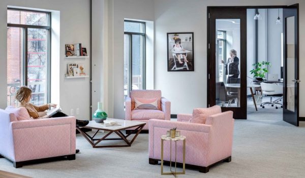 Sitting area with pink chairs 